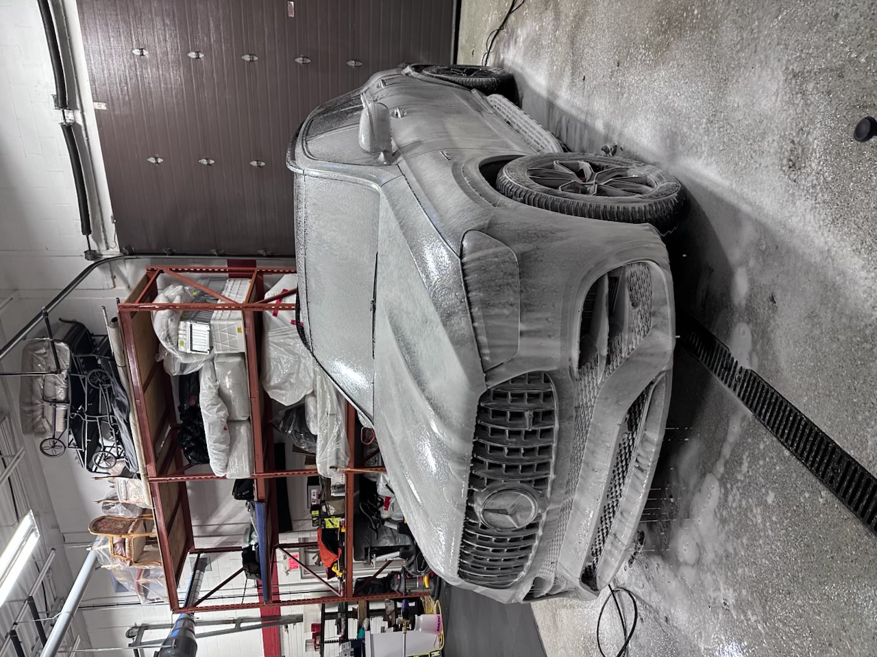 Mercedes SUV during professional snow foam detailing